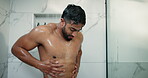Soap, beauty and shower with man in bathroom for body care, morning routine and water splash. Skincare hygiene, glow and dermatology with person washing in home for cleaning, grooming and hydration