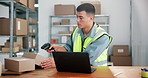 Barcode scanner, laptop and logistics with courier man in depot for parcel delivery or tracking. Box, computer and supply chain employee in distribution center or post office for export and import