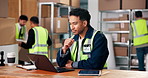 Man, reading and laptop for logistics at warehouse for research, supply chain and schedule delivery. Male person, pc and review for stock, planning inventory and shipping information for distribution
