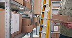 Logistics, clipboard and hands with parcel in warehouse for order management, planning or delivery. Dispatcher, man or distribution checklist for supply chain, packaging or inventory update in depot