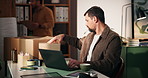 Box, laptop and logistics with man in office for delivery, distribution or shipping management. Computer, supply chain and tracking with person typing at desk for courier service or online order