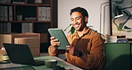 Ecommerce, laptop and happy man with tablet in home office, online sales or reading funny customer review. Tech, small business or entrepreneur laugh at positive message, supply chain or ship package