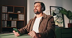 Thinking, man and headphones with phone at house for streaming, listening to music and podcast. Mature person, dancing and mobile with latest playlist, vibing to song and media audio of entertainment