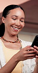 Happy, phone and reading with woman in pilates studio for social media, workout post and online. Communication, fitness update and exercise with person in club for wellness, health and connection