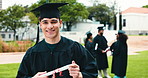 Graduation, face and man with diploma outdoor for education, award ceremony or celebration. University qualification, happy students or certificate at campus event for academic success or achievement