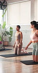 Fitness, class and yoga with women in studio for learning, workout and wellness club. Balance, posture exercise and health with group of people on floor for pilates lesson, flexibility and gym
