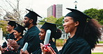 Group, applause and happy for graduation, university and ceremony for academic success and students. College, celebration and people with robes for achievement, clapping and smile for education goals