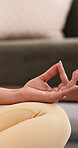 Hands, person and meditation for yoga at house for fitness, morning zen and mindfulness practice. Closeup, woman and lotus pose with inner peace, spiritual awareness and holistic balance for wellness
