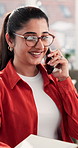 Talking, woman and smile in office with phone call for communication, human resources advice or chat. HR, advisor and person writing in workplace with tech for networking, conversation or discussion.