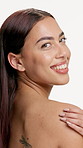 Smile, face and shoulder touch with model for skincare, wellness and glow for self care in studio. Woman, clean skin aesthetic or makeup with natural dermatology and portrait on white background