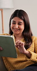 Woman, tablet and laugh in living room for social media, scroll and text message on sofa. Female person, reading and mobile app for creating profile, chat and explore on dating website in apartment
