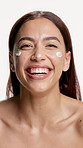Face, cream and woman with beauty, funny and dermatology with glow, shine and aesthetic. Laughing, creme and person with cosmetics, lotion and skincare with healthy skin on white studio background