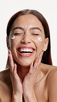 Face, cream and woman with smile, dermatology and glow on white studio background. Laughing, creme and happy person with skincare, lotion and moisture with cosmetics, treatment and healthy skin