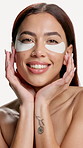 Face, skincare or woman with eye mask in studio, natural beauty or hydration in wellness product. Portrait, person or dermatology with patches for dark circles, self care or glow on white background.