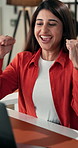 Happy woman, winning and fist pump with laptop for good news, promotion or bonus in office. Excited, female person or winner with smile on computer for business success or celebration in workplace