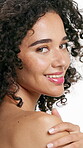 Face, smile and woman for skincare in studio for beauty, smooth texture and natural shine. Portrait, person and touch shoulder of healthy skin, dermatology results and facial glow on white background