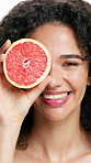 Grapefruit, skincare and face of woman in studio for vitamin c, treatment and cosmetics for smile. Portrait, fruit and model with diy facial, organic or skin detox with citrus on white background