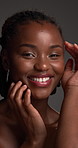 Face, skincare and happy black woman with beauty, self care and skin wellness in studio. Smile, dermatology and model with makeup cosmetics, aesthetic or collagen treatment results on gray background
