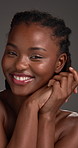 Beauty, face and laughing with black model in studio for dermatology results or satisfaction. Cosmetics, funny and skincare with happy African woman on gray background for glow, self care or wellness