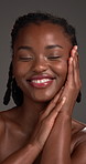 Happy, skincare and face of black woman in studio for smooth skin, glow and shine for facial. Touch, spa and portrait of African woman for natural beauty, wellness or dermatology on dark background
