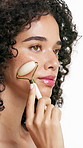 Face roller, skincare and woman in studio with cosmetic, shine and lymphatic drainage. Model, antiaging and tool for wellness, grooming routine or beauty for dermatology aesthetic on white background