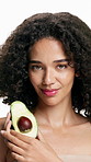 Avocado, skincare and face of woman in studio for dermatology, treatment and cosmetics for smile. Portrait, fruit and model with diy facial, organic or skin detox with cleaning on white background