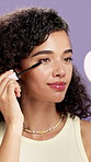 Mascara, brush and woman in studio, beauty and aesthetic with confidence on purple background. Apply makeup product, person and eyelash extension with glow, lashes and volume with length and shine