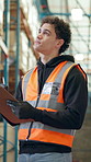 Clipboard, logistics and man in warehouse for shipping manager, inventory or export report. Checklist, supply chain storage or cargo inspection with employee in factory for delivery quality control