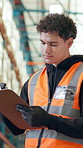 Logistics, worker and writing on clipboard in warehouse for stock inspection, order picking or shipping. Picker, man and happy with notes for inventory management, tracking inbound cargo or low angle