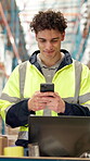 Logistics, worker and typing with phone in warehouse, online schedule or texting for package storage info. Laptop, notification or man with mobile app for team group chat, shipping agenda and message