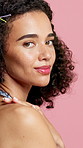 Face, hair style and woman in studio, beauty and aesthetic on pink background. Shine, cosmetics and person with wellness, healthy skin and lip gloss with dermatology, texture and skincare with glow
