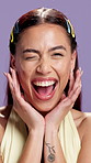 Face, skincare and excited woman with wink in studio, natural dermatology or cosmetology. Portrait, happy model and cosmetics for beauty, touch skin or collagen treatment results on purple background