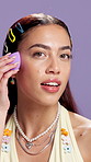 Beauty, makeup tools and time lapse with face of woman in studio for shine, foundation and self care. Blush powder, aesthetic and mascara with person on purple background for lip gloss cosmetics