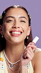 Face, lip gloss and woman in studio, smile and dermatology on purple background. Cosmetics, luxury product and person with aesthetic, skincare and wellness with shine, grooming or treatment for glow