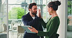 Business people, tablet and excited with high five for success, winning or teamwork at office. Businessman, woman and celebration with smile, feedback or tech for good news together at workplace