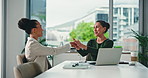 Meeting, handshake and women with laptop, smile and discussion for approval business loan in office. Happy, entrepreneur and shaking hands for funding opportunity, agreement or successful application