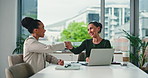 Office, handshake and women with laptop, smile and discussion for approval business loan in meeting. Happy, entrepreneur and shaking hands for funding opportunity, agreement or successful application