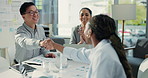 Office, business people and handshake in meeting for success, investment merger or clap with chart. Team, smile and shaking hands for financial partnership, acquisition or  deal celebration with data