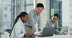 Business, laptop and team with paperwork advice for finance report, forecasting training and help. Financial intern, people and guidance on budget comparison and investment tips in coworking office