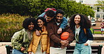 Face, group and hug at university, friends and bonding with basketball on break, happy or discussion. College students, embrace and humor for funny joke, talk and people with scholarship or education