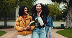 Walking, group and women with book, university and laughing on campus, scholarship and conversation. Talking, friends and people with backpacks on break, college students and bonding with funny joke