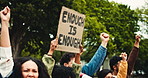 Fists, rally and students with sign, campus and demand for change, group and fighting for education. Activists, message and person with board for financial crisis, debt and tuition fees in college