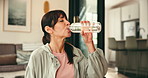 Fitness, drink water and woman rest in living room, indoor activity and difficult exercise for thirst. Hydration, workout routine and person relax with liquid in home, break or completion with flare.
