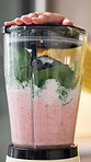 Start, smoothie and blender with hands in kitchen for detox, nutrition and vitamins. Fruits, balance diet and protein shake with person and machine in home for wellness drink, digestion and health