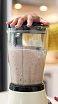 Detox, smoothie and blender with hands in kitchen for health, nutrition and vitamins. Fruits, balance diet and protein shake with person and machine in home for wellness drink, digestion and minerals