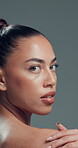 Face, woman and shoulder for skincare in studio with beauty, healthy skin and smooth texture. Portrait, female person and cosmetics for bodycare, dermatology results and wellness on gray background