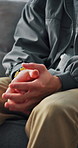 Therapy, hands and man with depression, counseling and mental health with recovery support. Person, patient and share trauma with body language, psychology or closeup with consultation or nervous