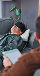 Therapist, man and blindfold on sofa with tablet for mental health, support or trauma process. Psychologist, tech or patient on couch with sleep mask for counseling technique, evaluation or wellness.