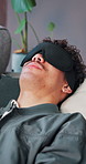 Eye mask, nodding and therapy with man on sofa for assessment, consulting or psychology. Breathing, counseling and mental health with patient in session for communication, hypnosis or treatment