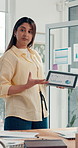 Business woman, tablet screen and chart for presentation, campaign performance or trends. Technology, presenter or marketer with display in office meeting for social media analysis, data and creative